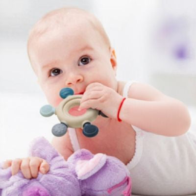 anneau de dentition en bois gencives sensibles