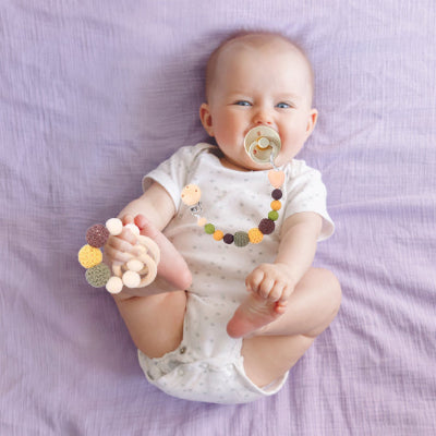 attache tetine anneaux de dentition avec