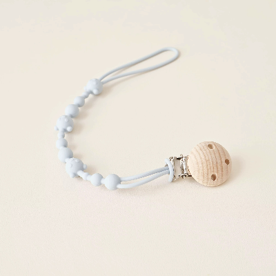 attache tetine bleu clair