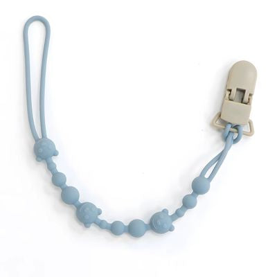 attache tetine bleus