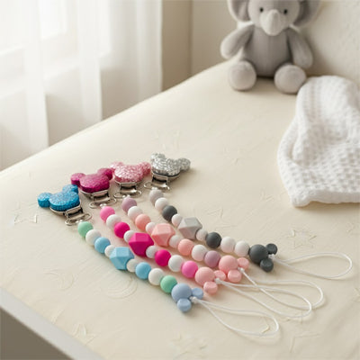 attache tetine coloris attrayant