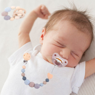 attache tetine design elegants