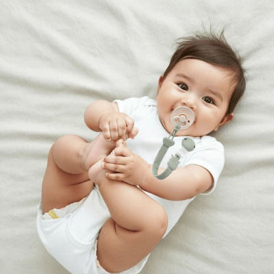 attache tetine design ludique avec motif animalier