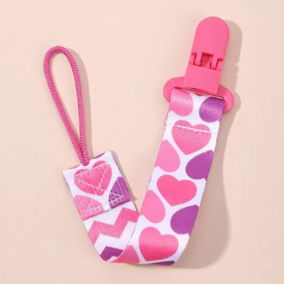 attache tetine designs colores et ludiques