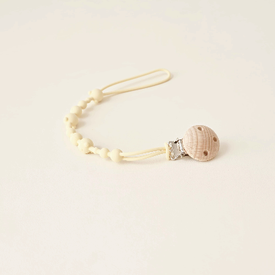 attache tetine jaunes