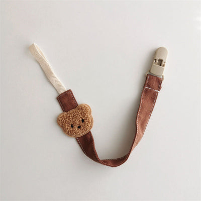 attache tetine marron