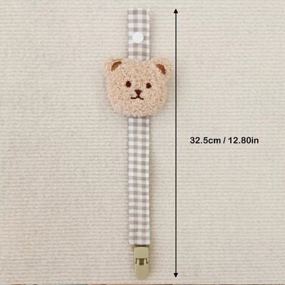 attache tetine ours beige