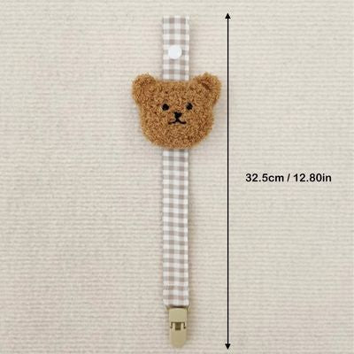 attache tetine ours brun