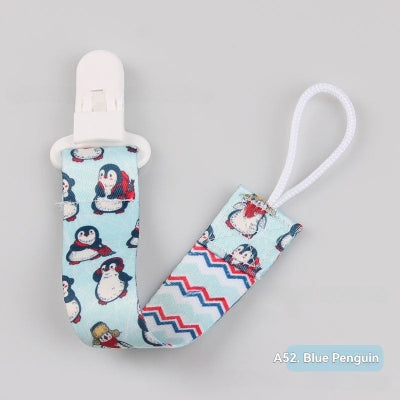 attache tetine pingouin bleu