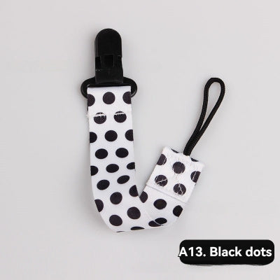 attache tetine point noir