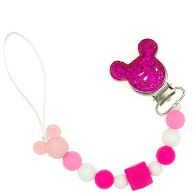 attache tetine rose fonce