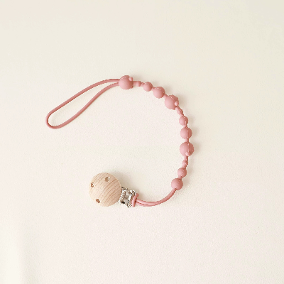 attache tetine rouge