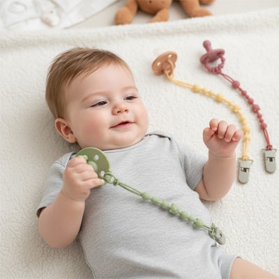 attache tetine systeme d attache universel