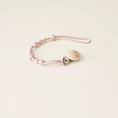 attache tetine violet 