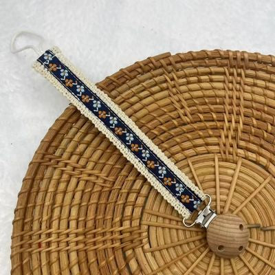 attache tetines bleu