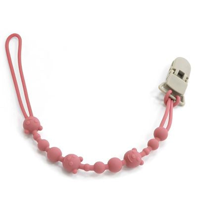 attaches tetine roses