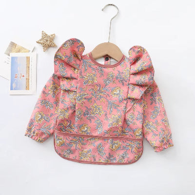 bavoir manche longue fleur rose        