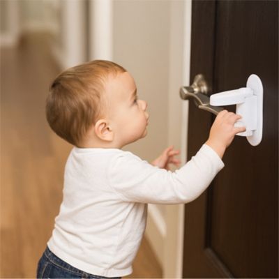 bloque porte pour bebe systeme de deverouillage