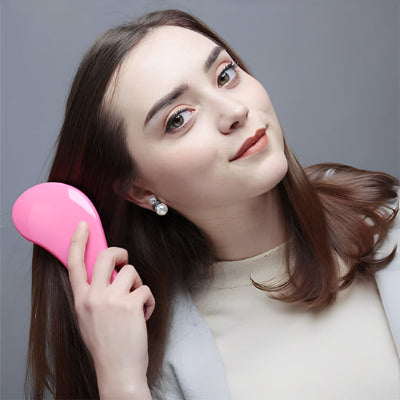 brosse a cheveux double fonction massage