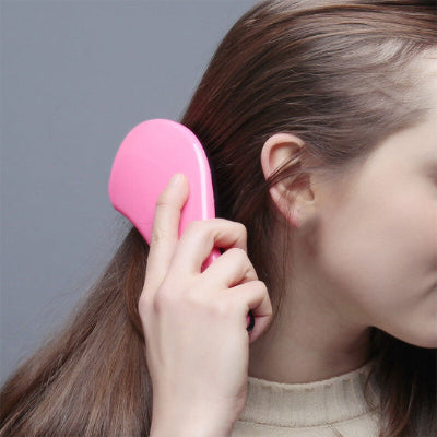 brosse a cheveux forme ergonomique