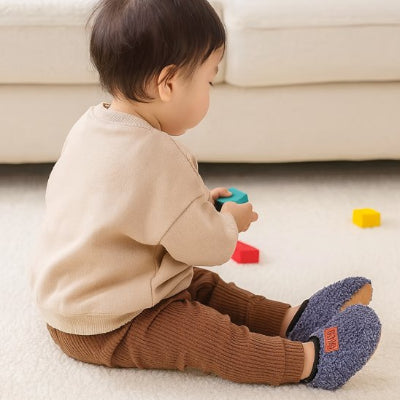 chausson bebe tissu confortable type eponge 