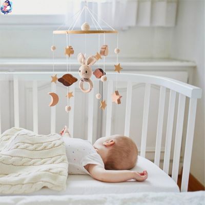 mobile bebe bois nordique sensoriel favorise le sommeil