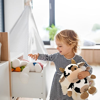 peluche vache enveloppante