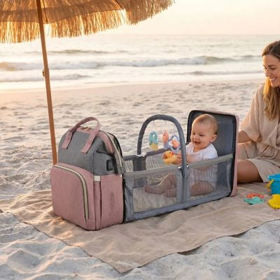 sac a langer avec lit utilise a la plage