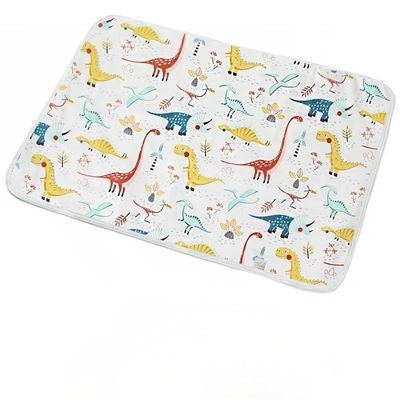 tapis a langer nomade dinosaures