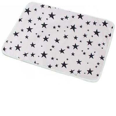 tapis a langer nomade etoile noir