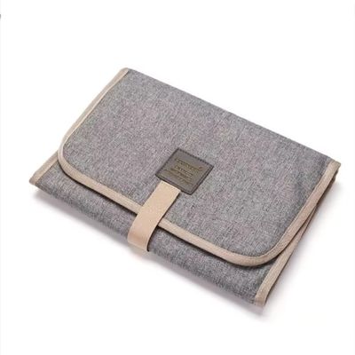 tapis a langer nomade gris clair