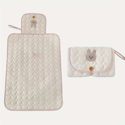 tapis a langer nomade lapin